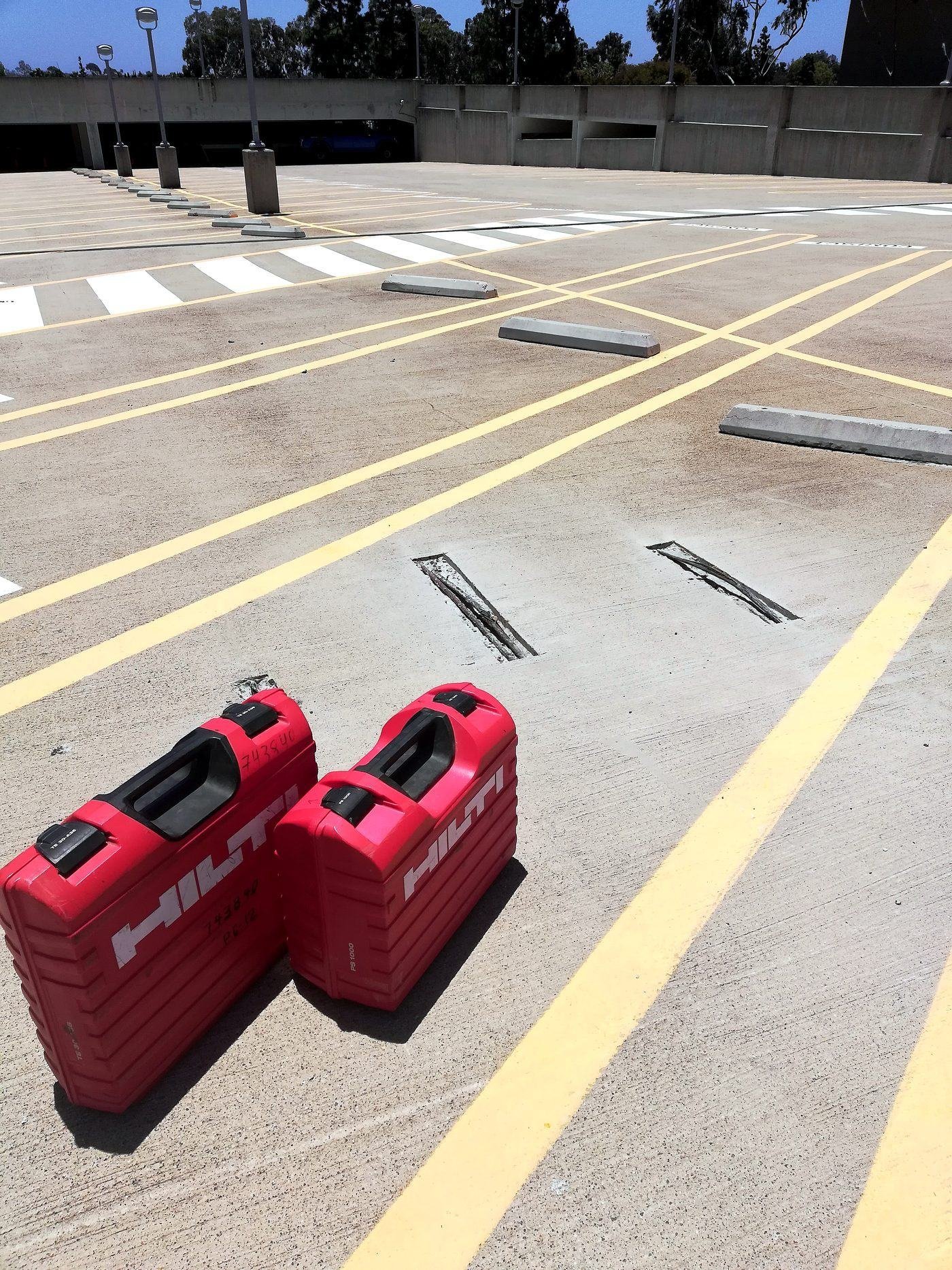 Concrete scanning on a parking structure deck during structural assessment