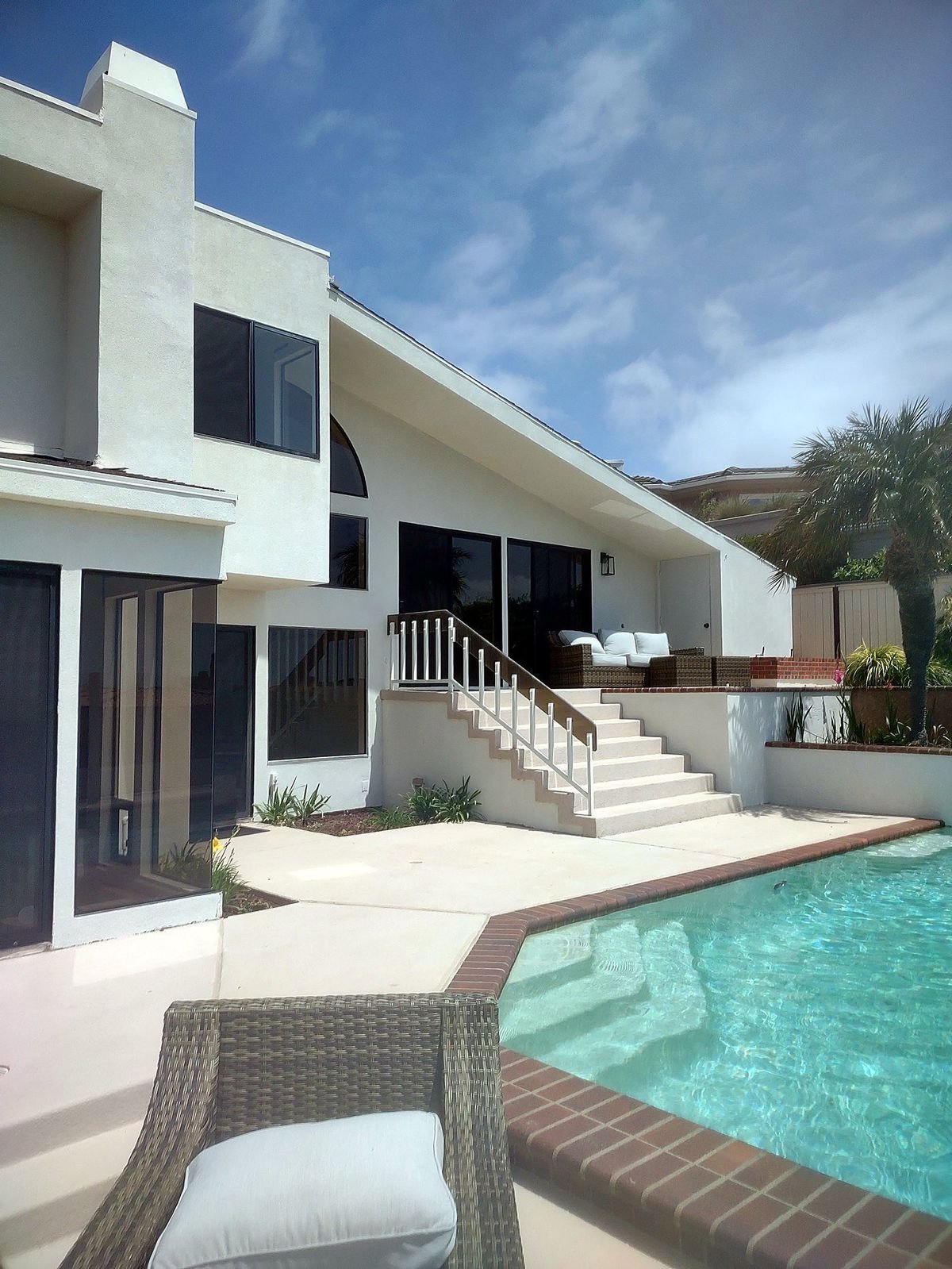 Contemporary white residence with pool and terraced patio, La Jolla, San Diego